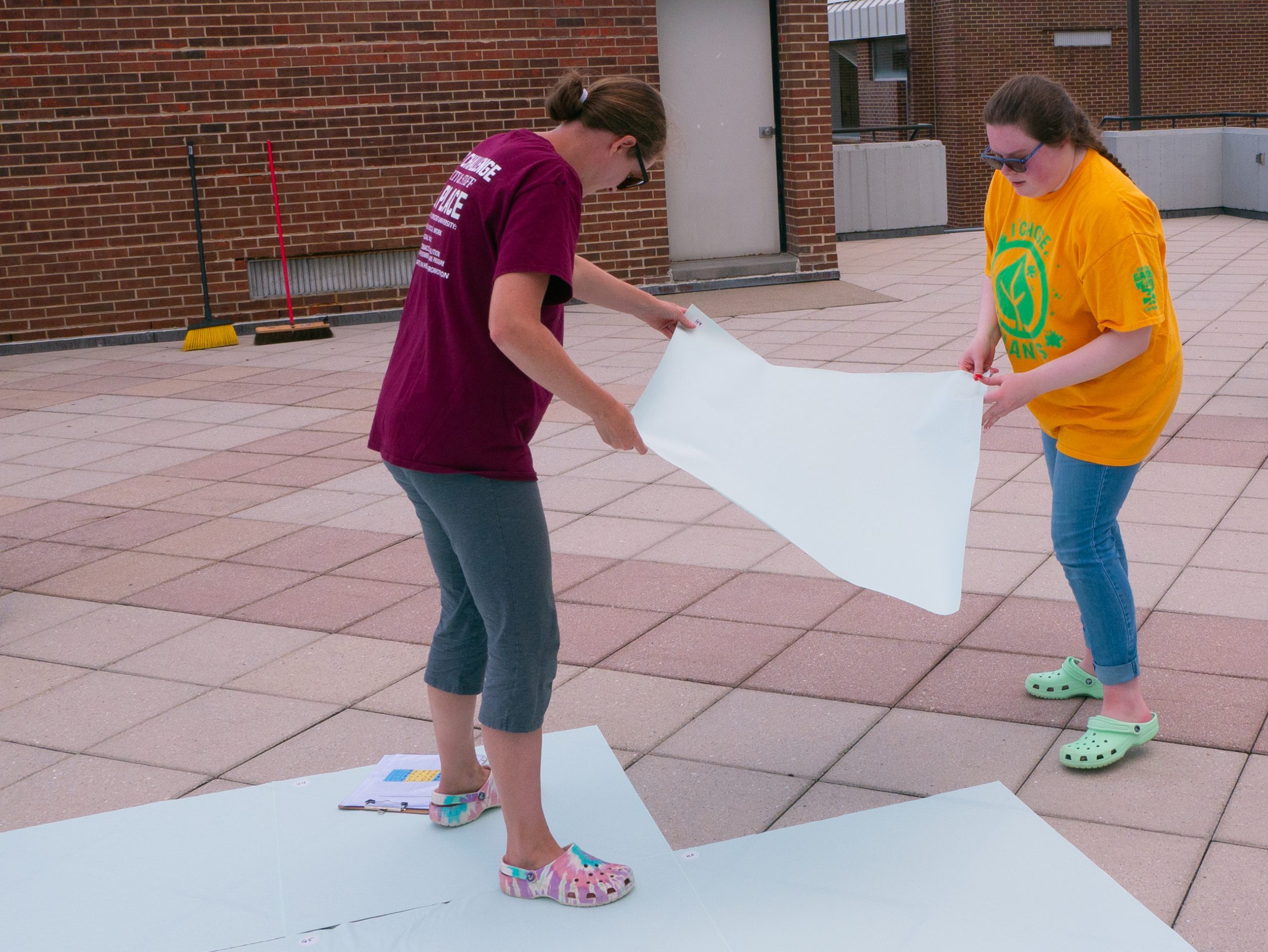Concord University staff and students painting the labyrinth