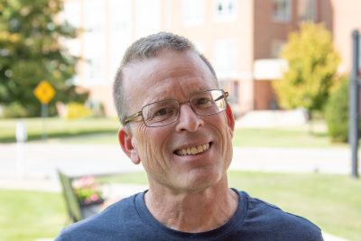 A photo of John Makous on a sunny Autumn day.