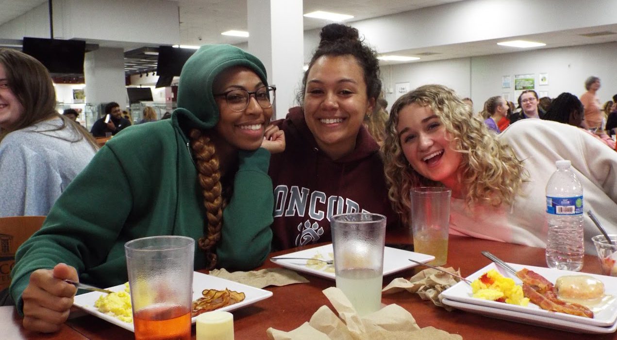Three students eating brunch together