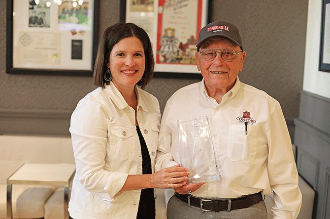 Mario Ciarlo receiving his CUAA award from Sarah Turner