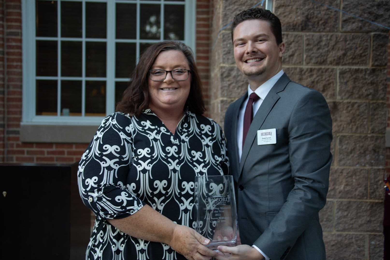 Outstanding Alumnus 2023, Dr. Susan Williams ‘91 pictured with Blake Farmer, Director of Alumni and Donor Relations