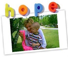 Melissa Powell holding her son Jonathan Powell