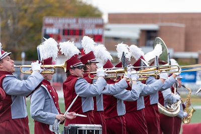 The marching band performing at half time during a Concord University football game