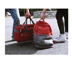 Students holding backpacks