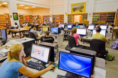 Students working on computers in the library