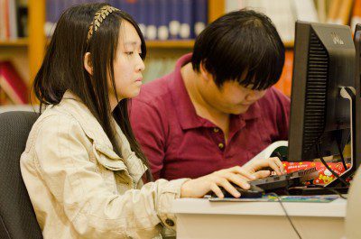 Students working in the library