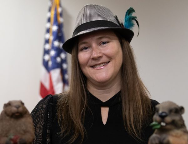 Lori McKinney, co-founder and administrator of The RiffRaff Arts Collective and this year's Grand Groundhog Watcher, pictured with Concord Charlie at Concord University's 2024 Groundhog Day breakfast