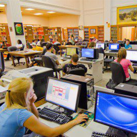 A group of students using the Marsh Library computer lab at Concord University