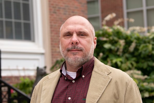 An image of Charles Ford in front of the CU Library.