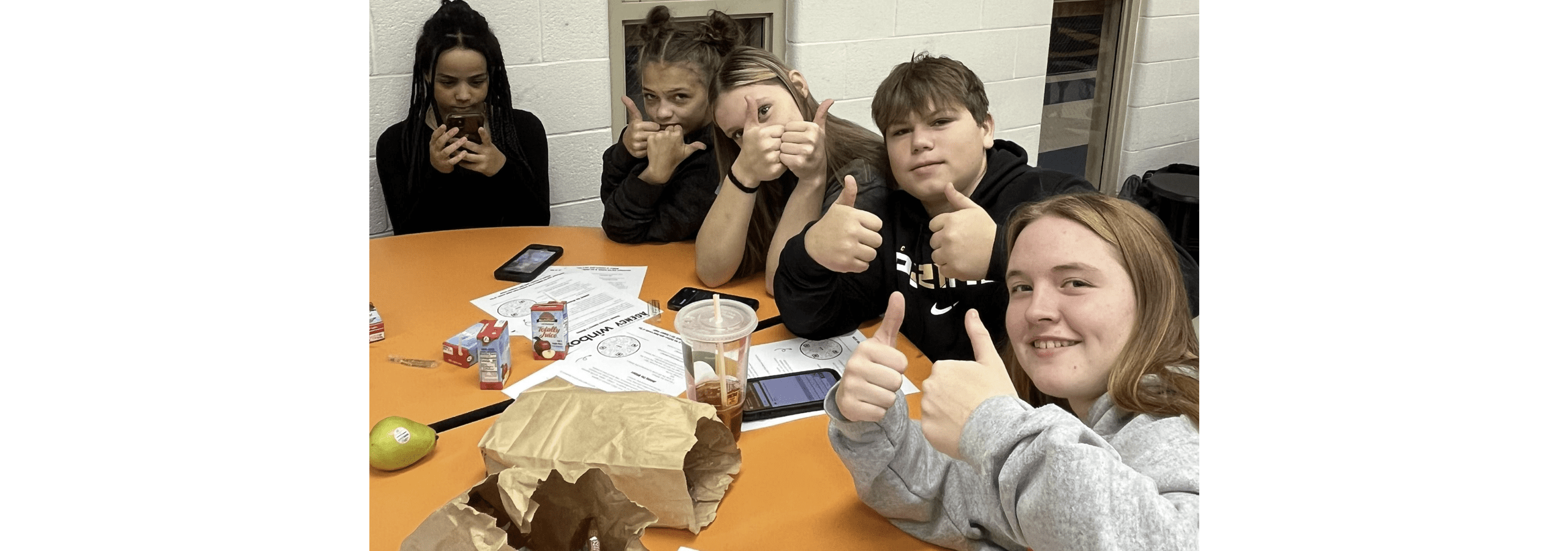 Eighth grade students in Summers County give a thumbs up during the Student Success Agency kick off event in Fall 2023.