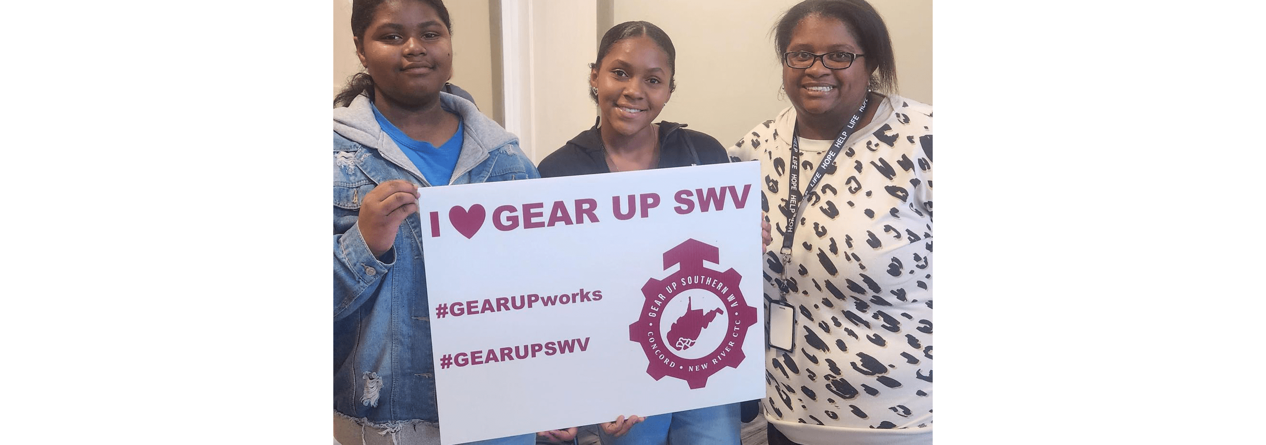 Students in Mercer County (left and middle) pose for a picture with GEAR UP SWV Local Coordinator Beth Henry during a Meet and Greet in Princeton, WV in Fall 2023.