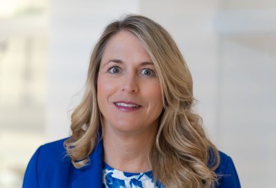 A photo of GEAR UP SWV Coordinator and Community Outreach Tammy Mills in front of a white background