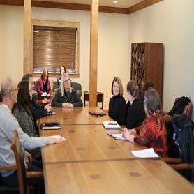 Miller-2.JPG Congresswoman Miller speaking with CU officials at a long, rectangular table